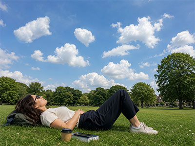 A woman cloud gazing for stress relief